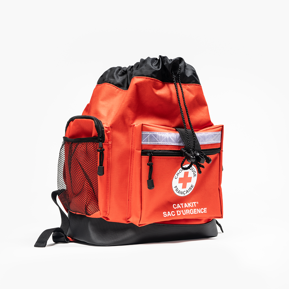 Sac à dos d’urgence familiale Catakit Croix-Rouge française rouge avec bande réfléchissante, fermeture à clip et poches latérales en filet